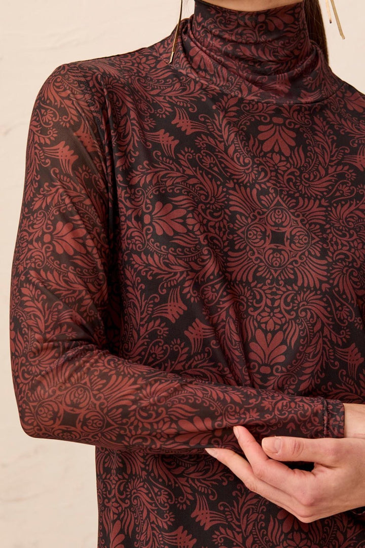 Mesh Print Turtleneck Lined Top from Tribal